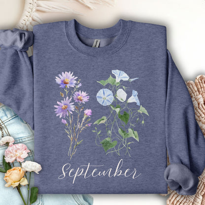 Heather Sport Dark Navy crewneck sweatshirt with watercolor morning glory and aster flowers, plus "September" text.