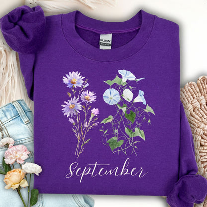 Purple Gildan sweatshirt with watercolor morning glory and aster flowers, plus "September" text.