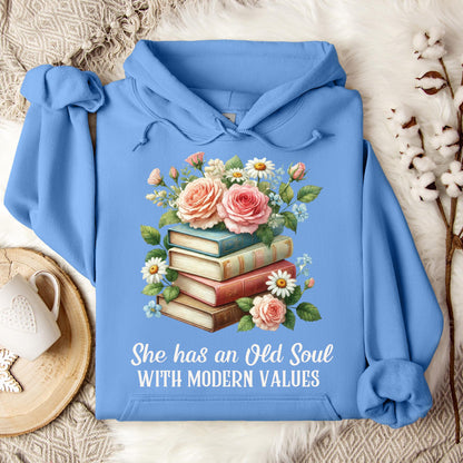 Carolina Blue Gildan 18500 hoodie with "She has an Old Soul WITH MODERN VALUES" text and floral book stack graphic.