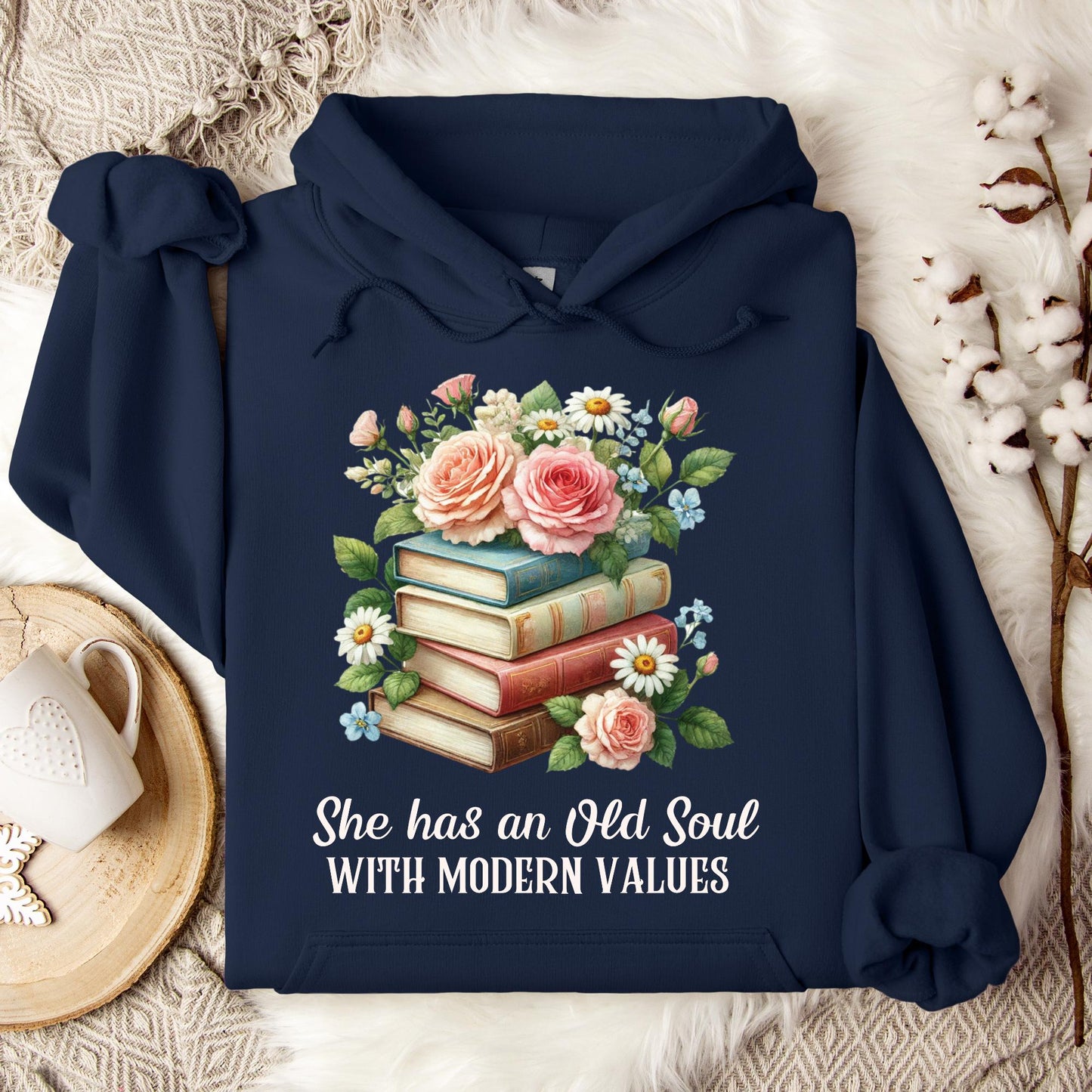 Navy Gildan 18500 hoodie with "She has an Old Soul with Modern Values" text and floral book stack graphic.