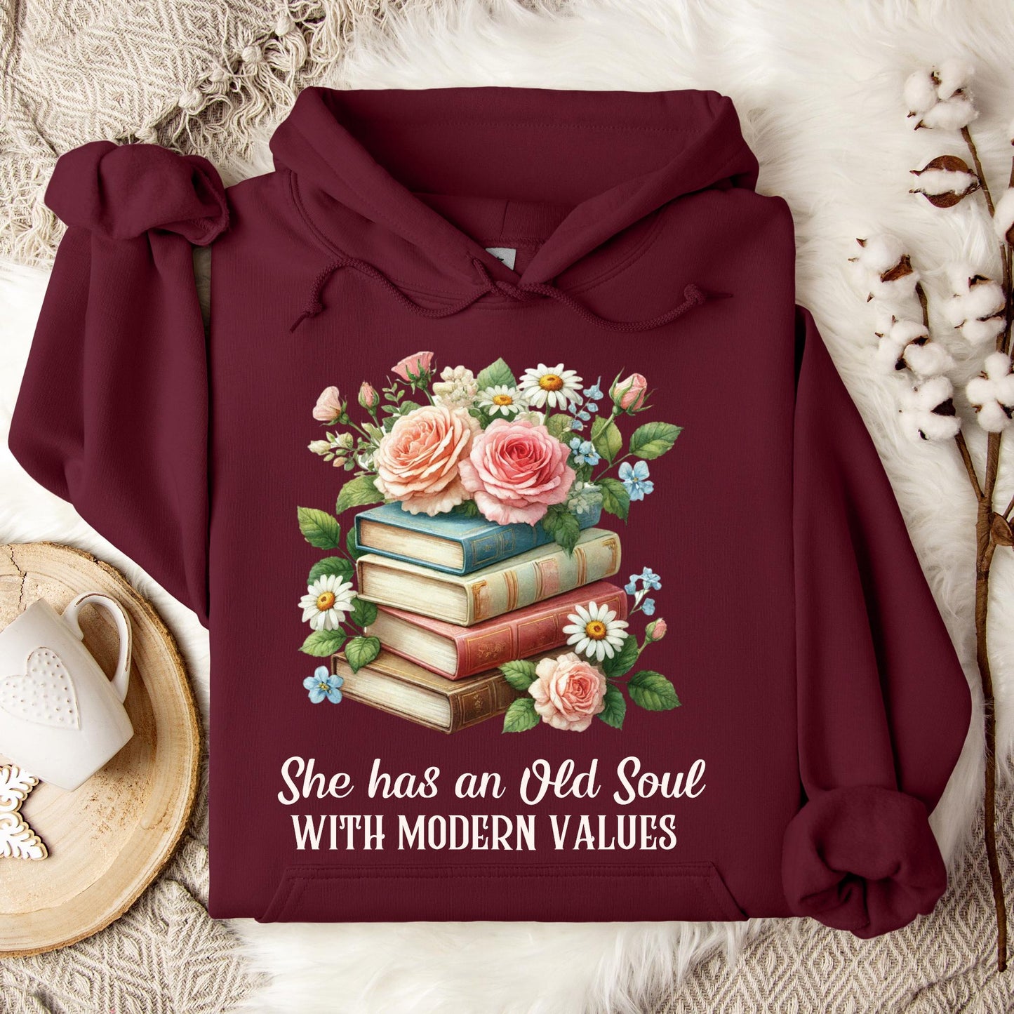 Maroon Gildan 18500 hoodie with "She has an Old Soul with Modern Values" text and floral book graphic.