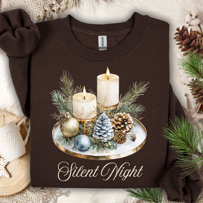 Dark Chocolate Gildan sweatshirt with watercolor "Silent Night" advent design featuring glowing candles, pinecones, and evergreens.
