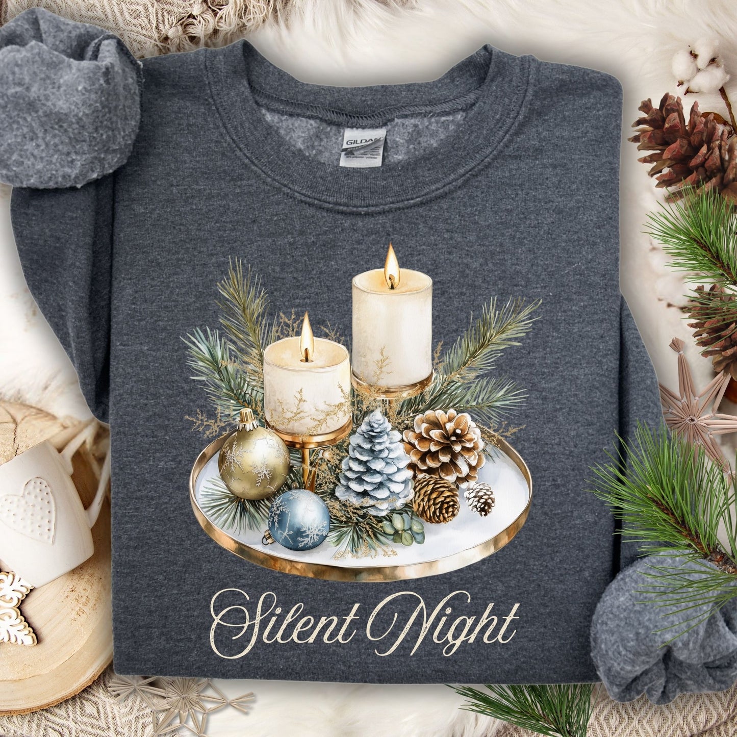 Dark Heather Gildan sweatshirt with watercolor "Silent Night" advent arrangement of candles, pinecones, and evergreens.