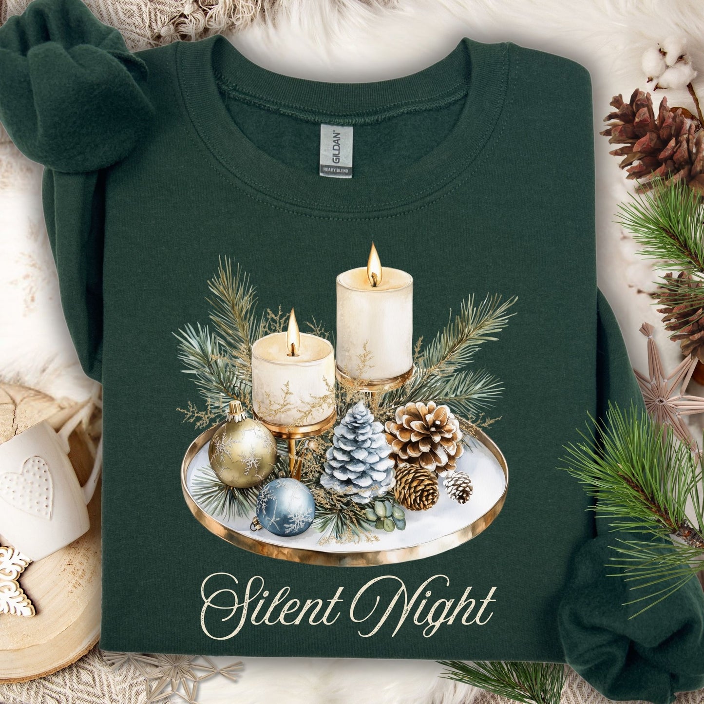 Forest Green Gildan sweatshirt with watercolor "Silent Night" advent arrangement: candles, pinecones, evergreens.