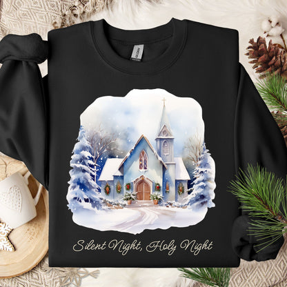 Black Gildan fleece sweatshirt with a snowy country chapel design and "Silent Night, Holy Night" text.