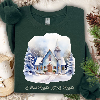 Forest green Gildan fleece sweatshirt with a snowy country chapel design and "Silent Night, Holy Night" text.