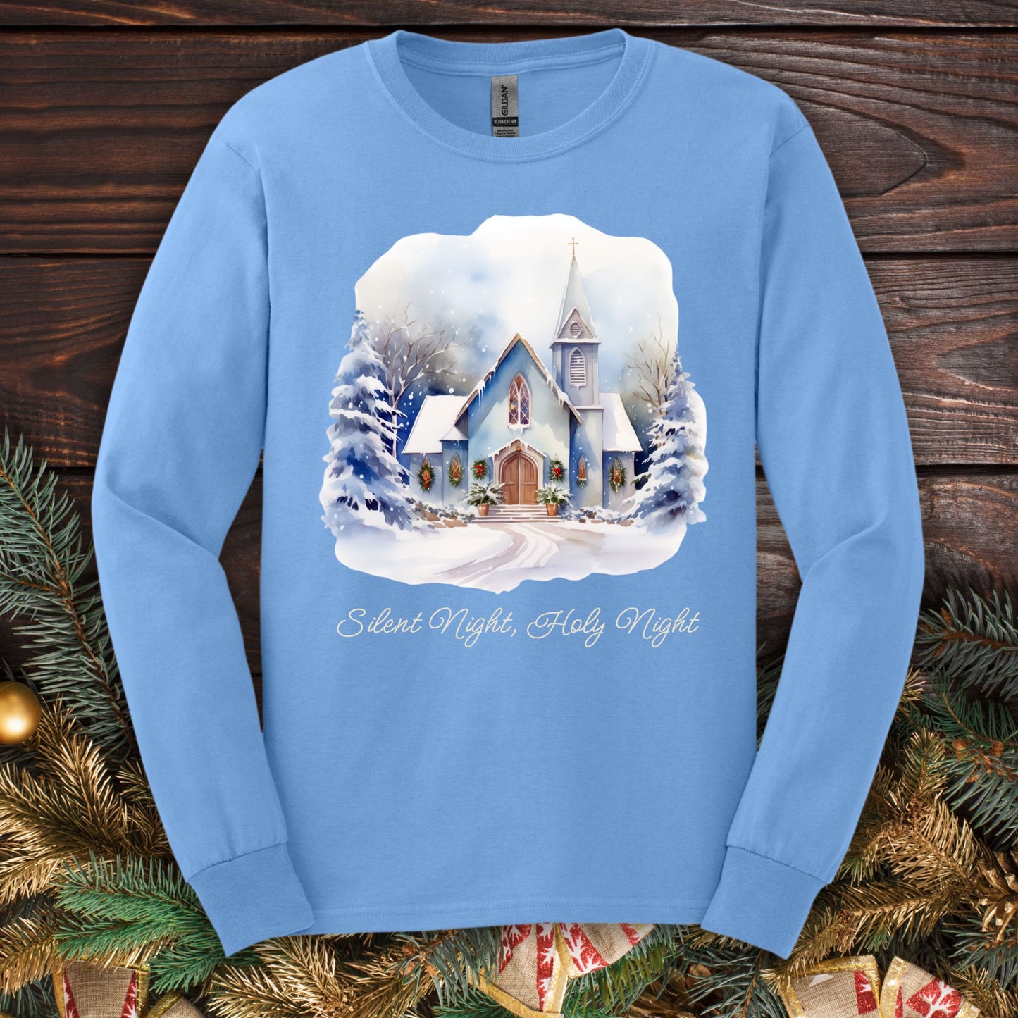 Carolina Blue heavyweight cotton long sleeve tee with a watercolor snow-covered chapel and "Silent Night, Holy Night.