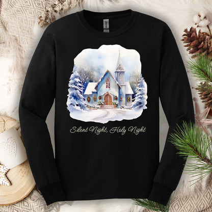 Black heavyweight cotton long sleeve tee with a watercolor snow-covered chapel and "Silent Night, Holy Night" text.