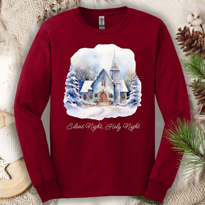 Cardinal Red long sleeve tee with a watercolor snow-covered country chapel and "Silent Night, Holy Night" text.
