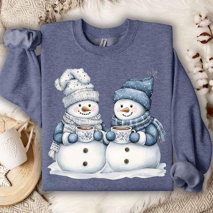 Heather Sport Dark Navy sweatshirt with two snowpeople in blue hats and mittens holding hot chocolate.