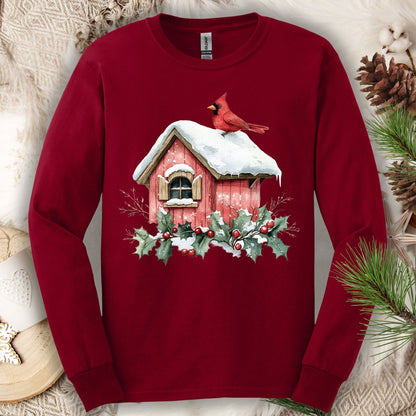 Cardinal Red Gildan Softstyle long sleeve tee with watercolor cardinal on snowy birdhouse and holly.