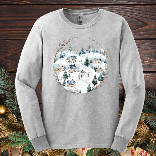 Ash Gildan Softstyle long sleeve tee with a watercolor folk-art snowy winter village design.