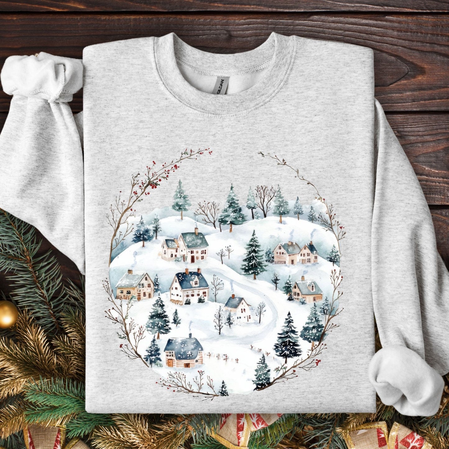 Ash Gildan fleece sweatshirt with a watercolor folk-art Nordic winter village design.