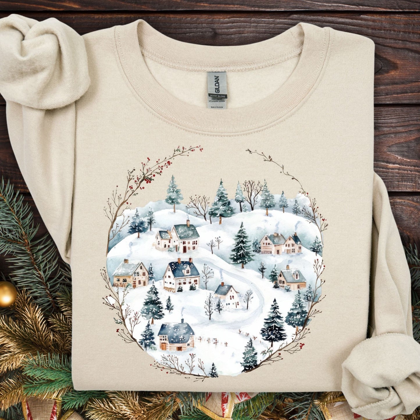 Sand Gildan fleece sweatshirt with a watercolor folk-art Nordic winter village design.