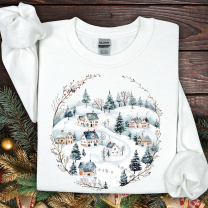 White Gildan fleece sweatshirt with a watercolor Nordic winter village design.