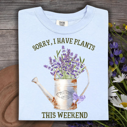 Hydrangea blue t-shirt with "Sorry, I Have Plants This Weekend" and a vintage watering can with lavender.