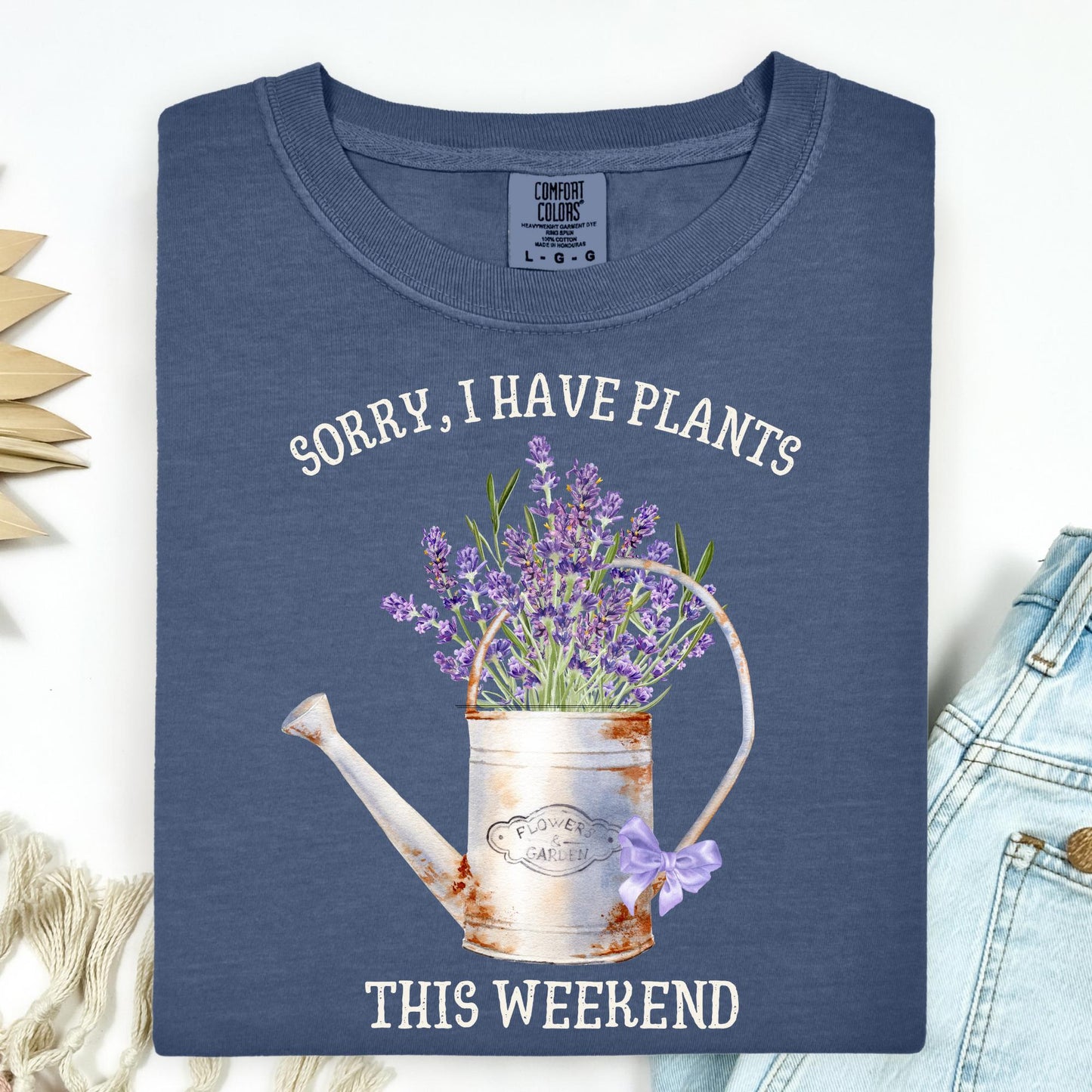 Denim "Sorry, I Have Plants This Weekend" t-shirt with a vintage watering can and watercolor lavender.