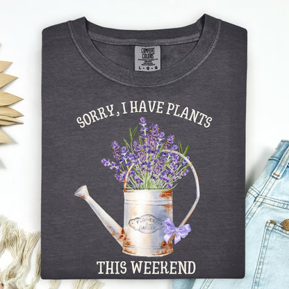 Pepper Comfort Colors t-shirt with "Sorry, I Have Plants This Weekend" and a vintage watering can with lavender.