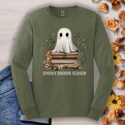 Military green Gildan long sleeve tee with a boho ghost on books and "Spooky Boooook Season" text.