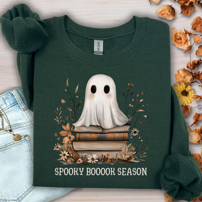 Forest Green Gildan sweatshirt with a boho ghost on vintage books and autumn wildflowers.