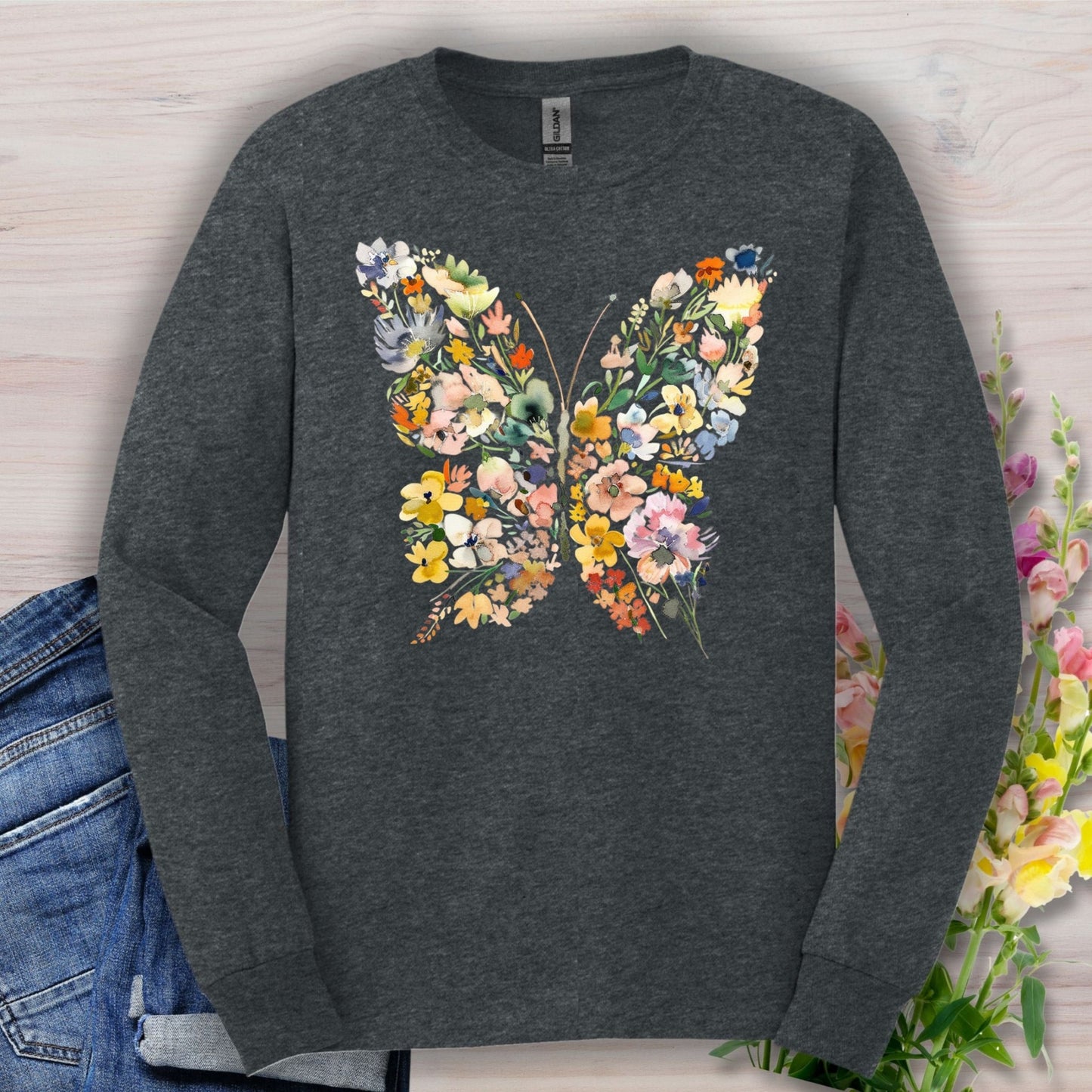 Dark Heather long sleeve tee with a colorful floral butterfly design, made from 50/50 cotton-poly fabric.