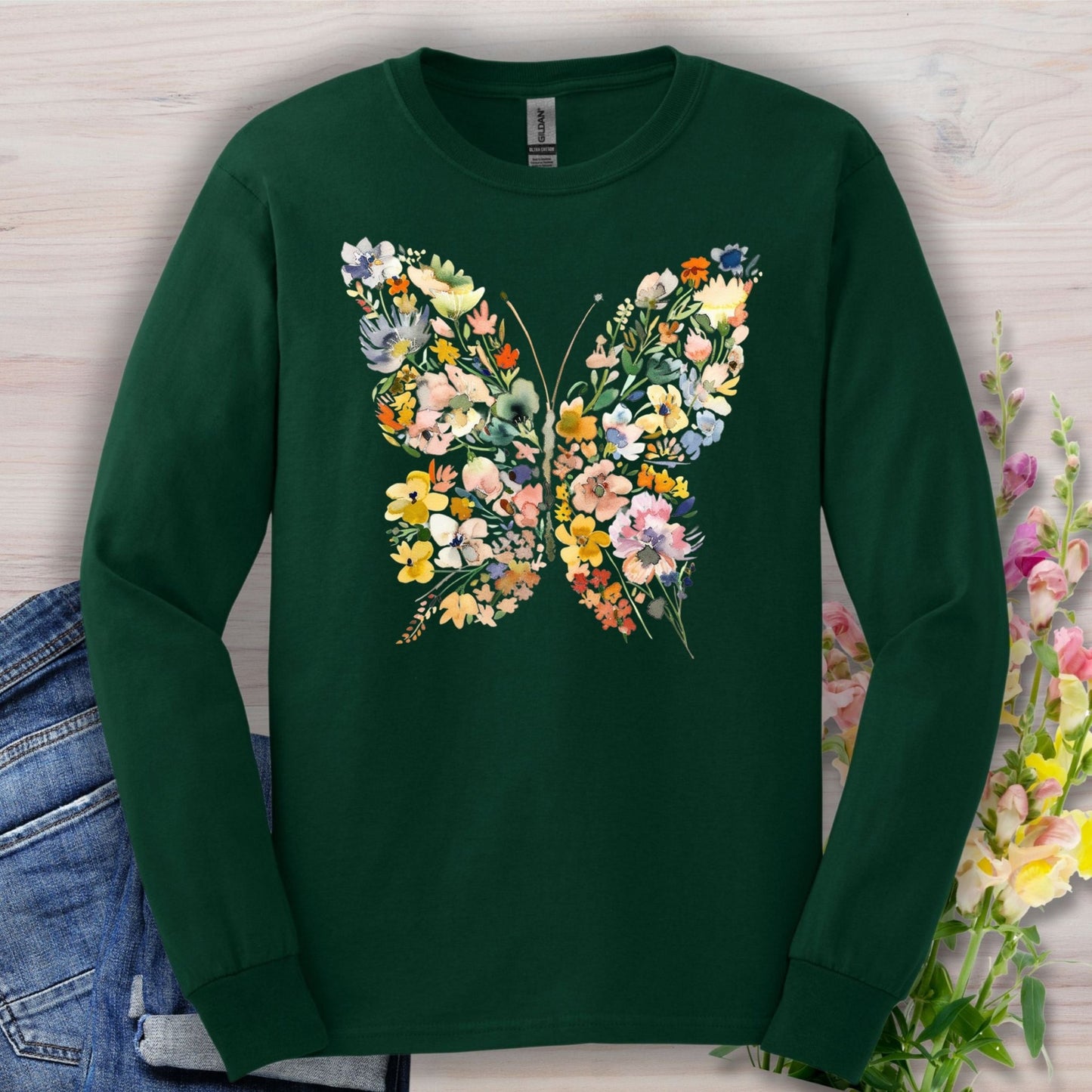 Forest Green long sleeve tee with a colorful watercolor floral butterfly design.