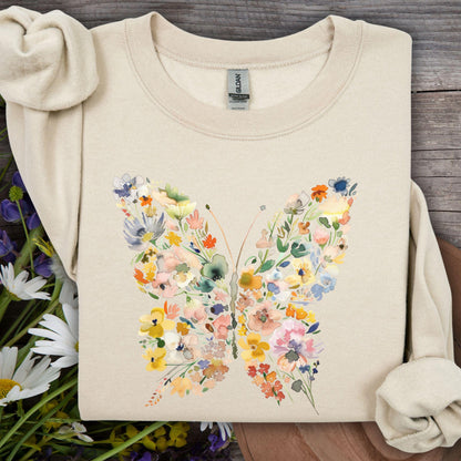 Sand sweatshirt with a watercolor floral butterfly design, featuring daisies and wildflowers.