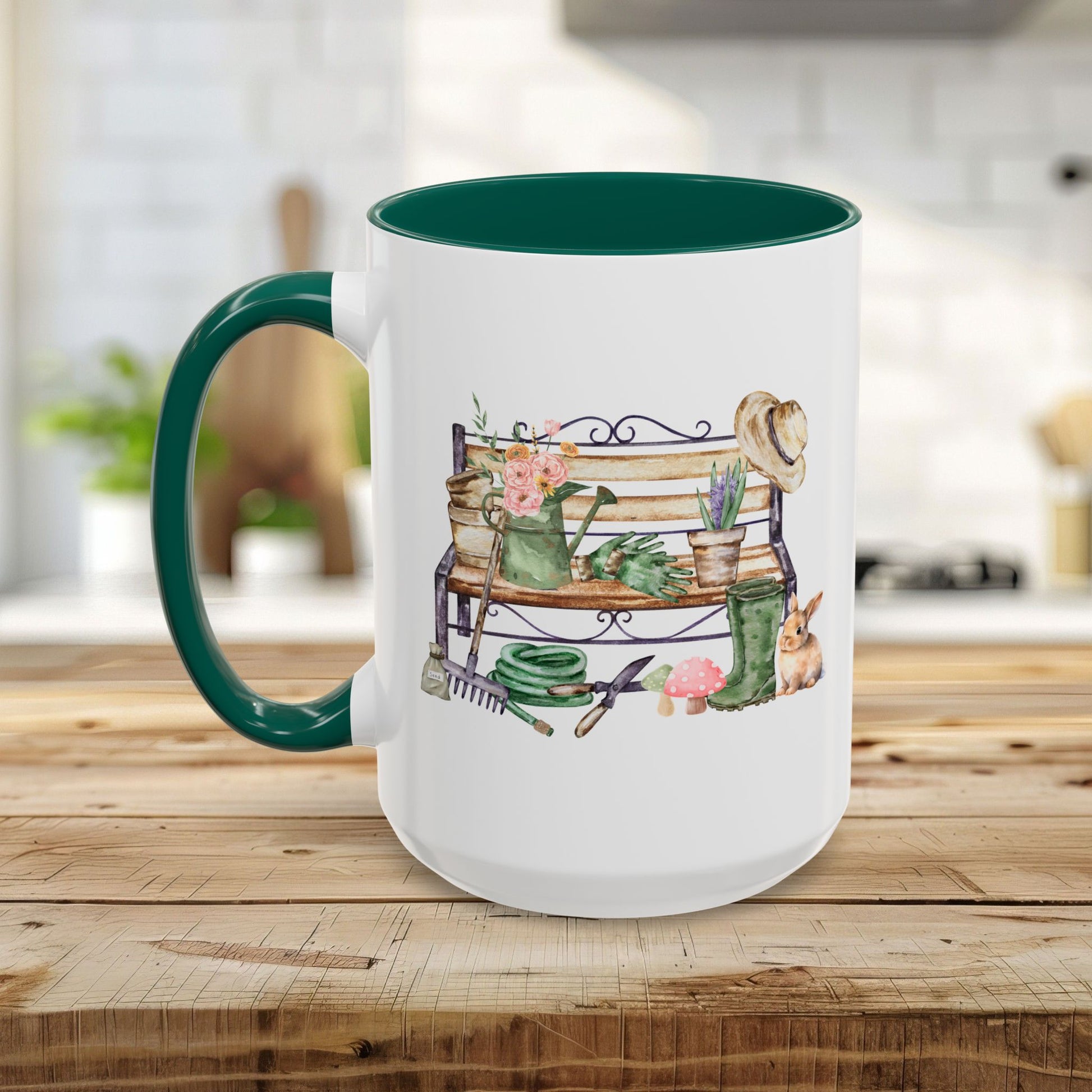 White ceramic mug with deep green handle and interior, featuring a watercolor garden bench design.