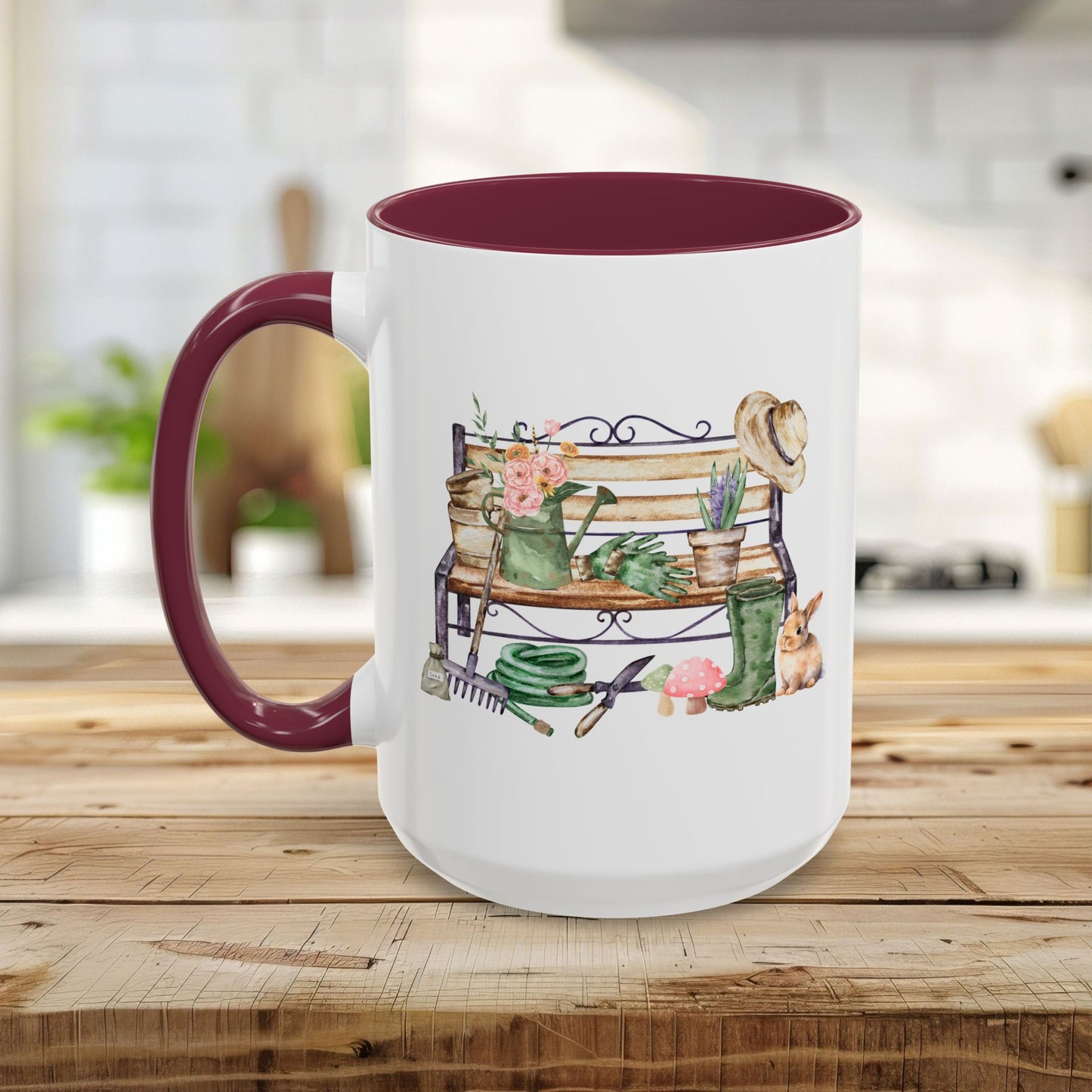 White ceramic mug with a deep green interior and handle, featuring a watercolor garden bench scene.