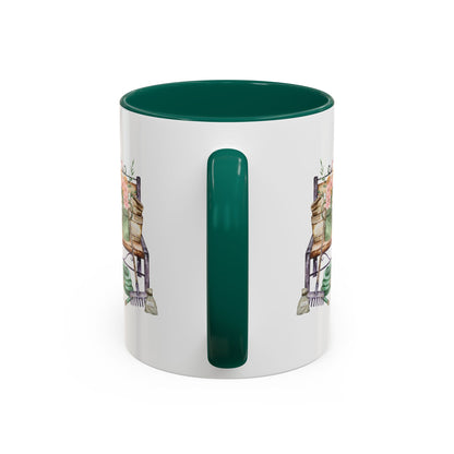 White ceramic mug with deep green interior and handle, featuring a watercolor garden bench design.
