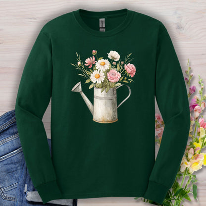 Forest Green long sleeve tee with a vintage watering can and botanical illustration of daisies, peonies, and cosmos.