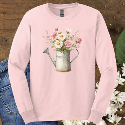 Light pink long sleeve tee with a vintage watering can and floral illustration.
