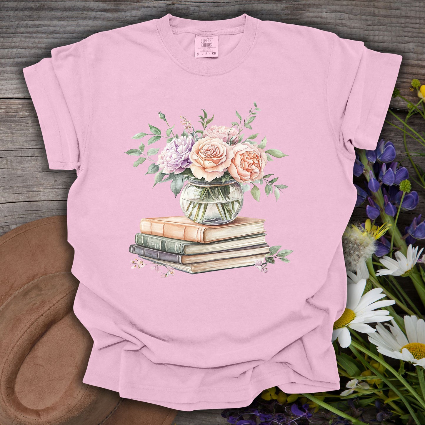 Pink S-size t-shirt with a watercolor bouquet in a vase on vintage books design.