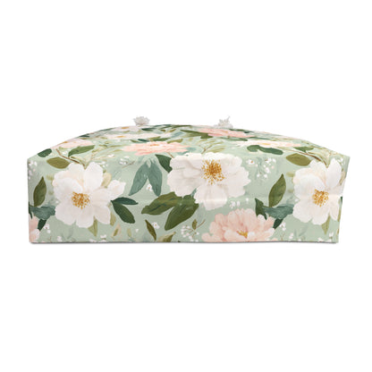 Mint green weekender bag with watercolor white and pink peonies, cream rope handles, and gold grommets.