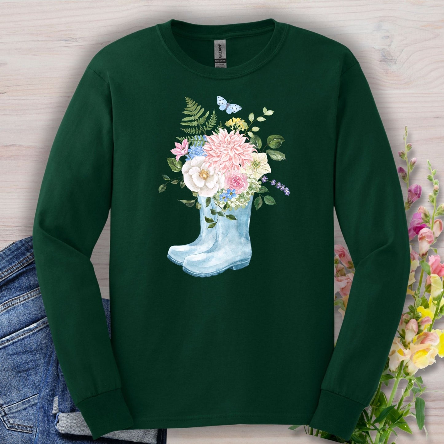 Forest Green long sleeve tee with watercolor rain boot floral design, featuring peonies, dahlias, and a butterfly.
