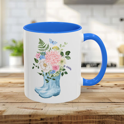 11oz glossy ceramic mug with a watercolor rain boot bouquet and Cambridge Blue handle/interior.