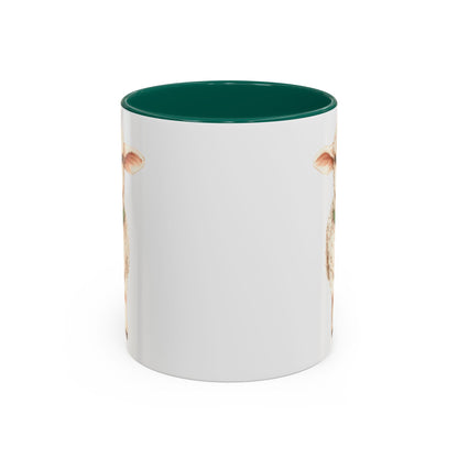 White ceramic mug with a green interior and handle, featuring a watercolor lamb with a clover pendant.