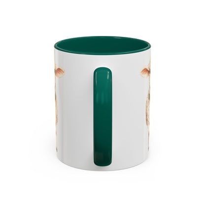 White ceramic mug with a green interior and handle, featuring a watercolor-style lamb wearing a clover pendant.