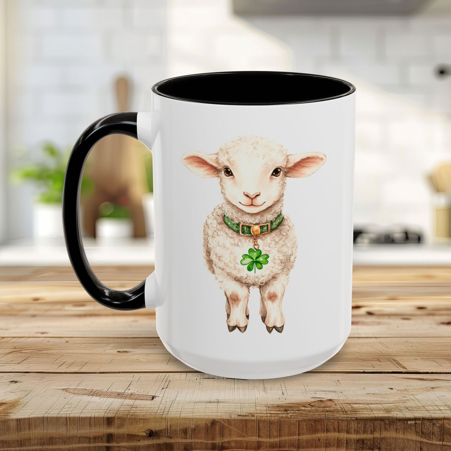 White ceramic mug with black handle and interior, featuring a watercolor lamb wearing a green clover pendant.