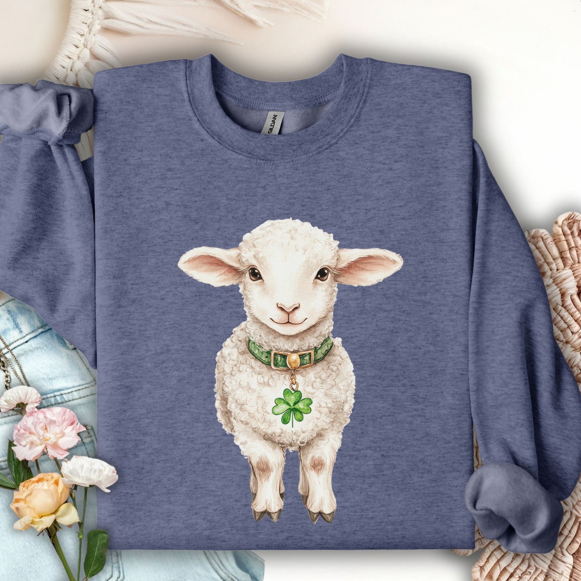 Heather Sport Dark Navy sweatshirt with a watercolor baby Irish lamb wearing a green collar and shamrock.