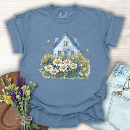 Blue Jean S garment-dyed cotton t-shirt with a hand-painted cottage and wildflower field design.