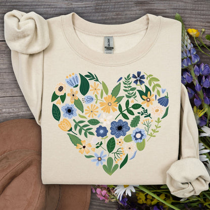 Sand unisex sweatshirt with a blue & yellow floral heart design.