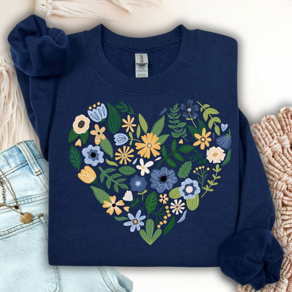 Navy unisex sweatshirt with a large heart design filled with blue, yellow, and cream floral blooms.