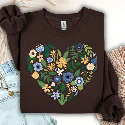 Dark chocolate sweatshirt with a large heart filled with blue, yellow, and cream floral designs.