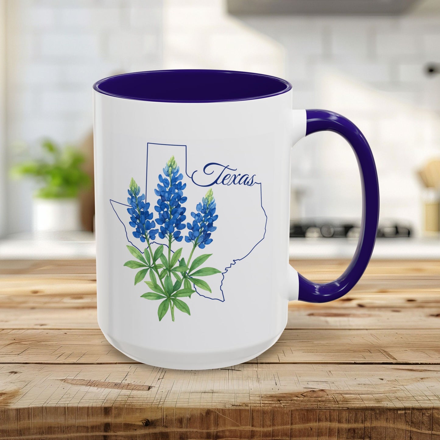 15oz white ceramic mug with bluebonnet design inside a Texas outline, purple interior and handle.