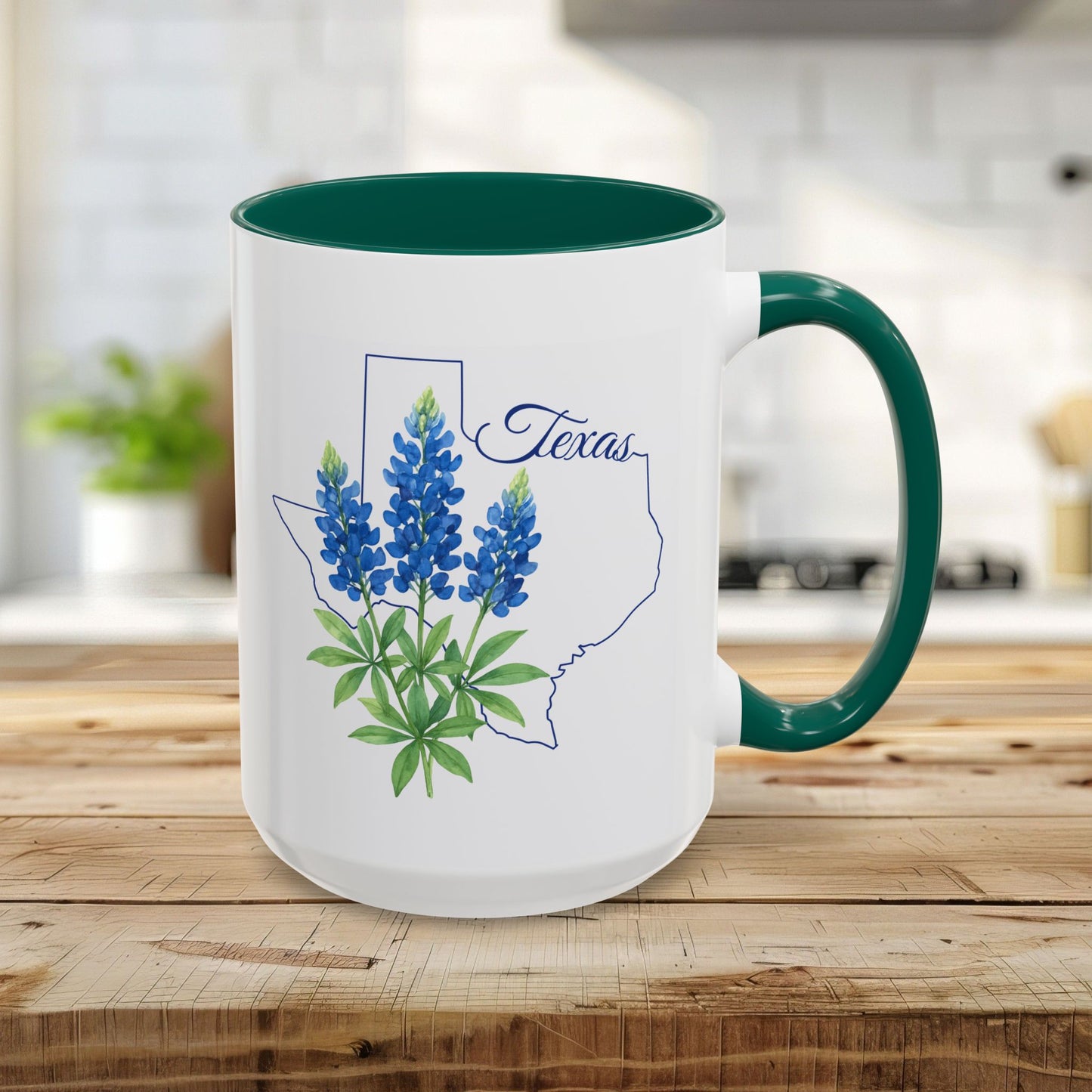 15oz ceramic mug with a green handle and interior, featuring bluebonnets inside a Texas outline.