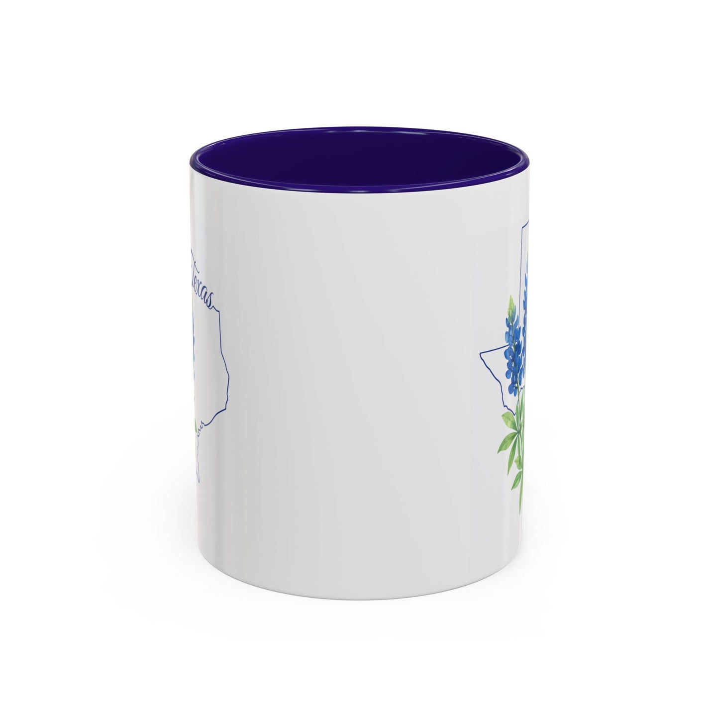 White ceramic mug with bluebonnet illustration inside a Texas outline and a navy blue interior.