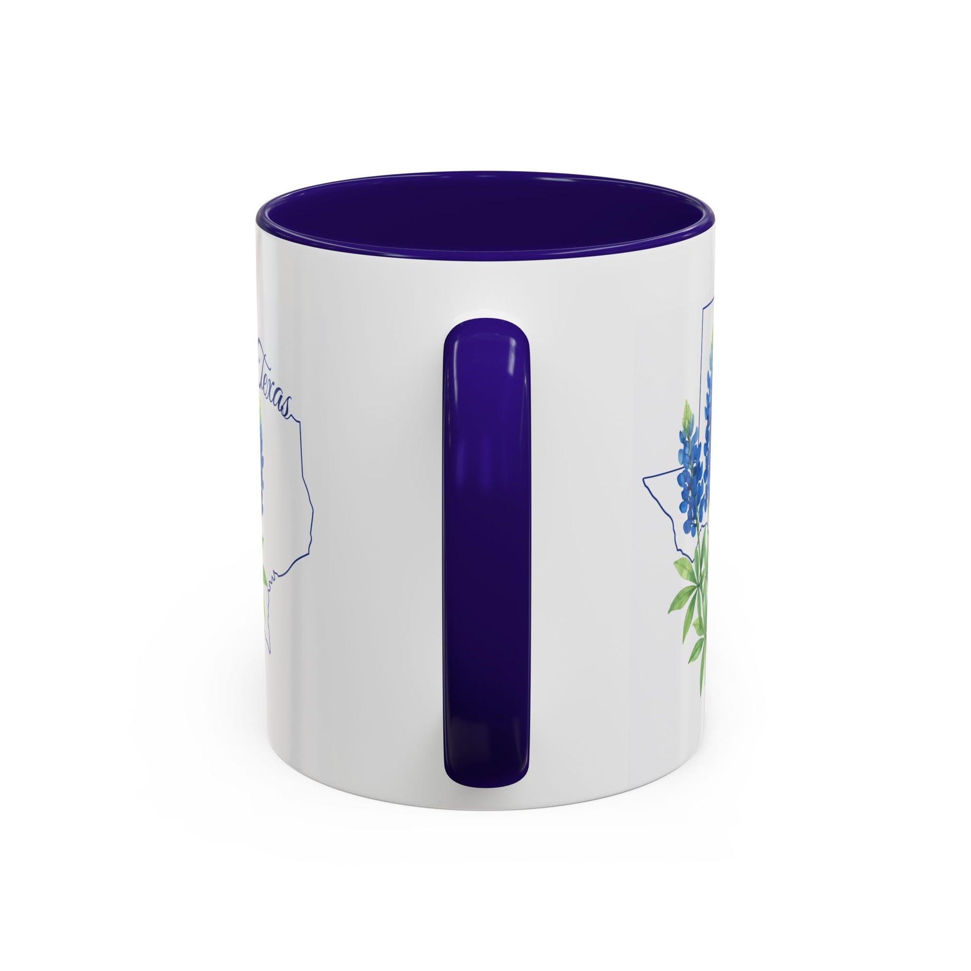 White ceramic mug with bluebonnet illustration inside a Texas outline, purple interior and handle.