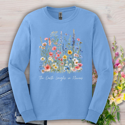 Carolina Blue long-sleeve tee with watercolor wildflowers and "The Earth Laughs in Flowers" text.