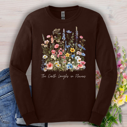 Dark Chocolate long-sleeve tee with watercolor wildflowers and "The Earth Laughs in Flowers" text.